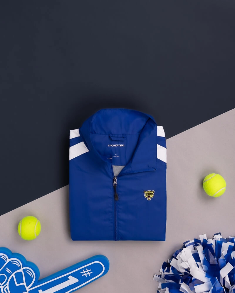 Get ready for game day with custom SPORT-TEK polos, jackets & layers.
